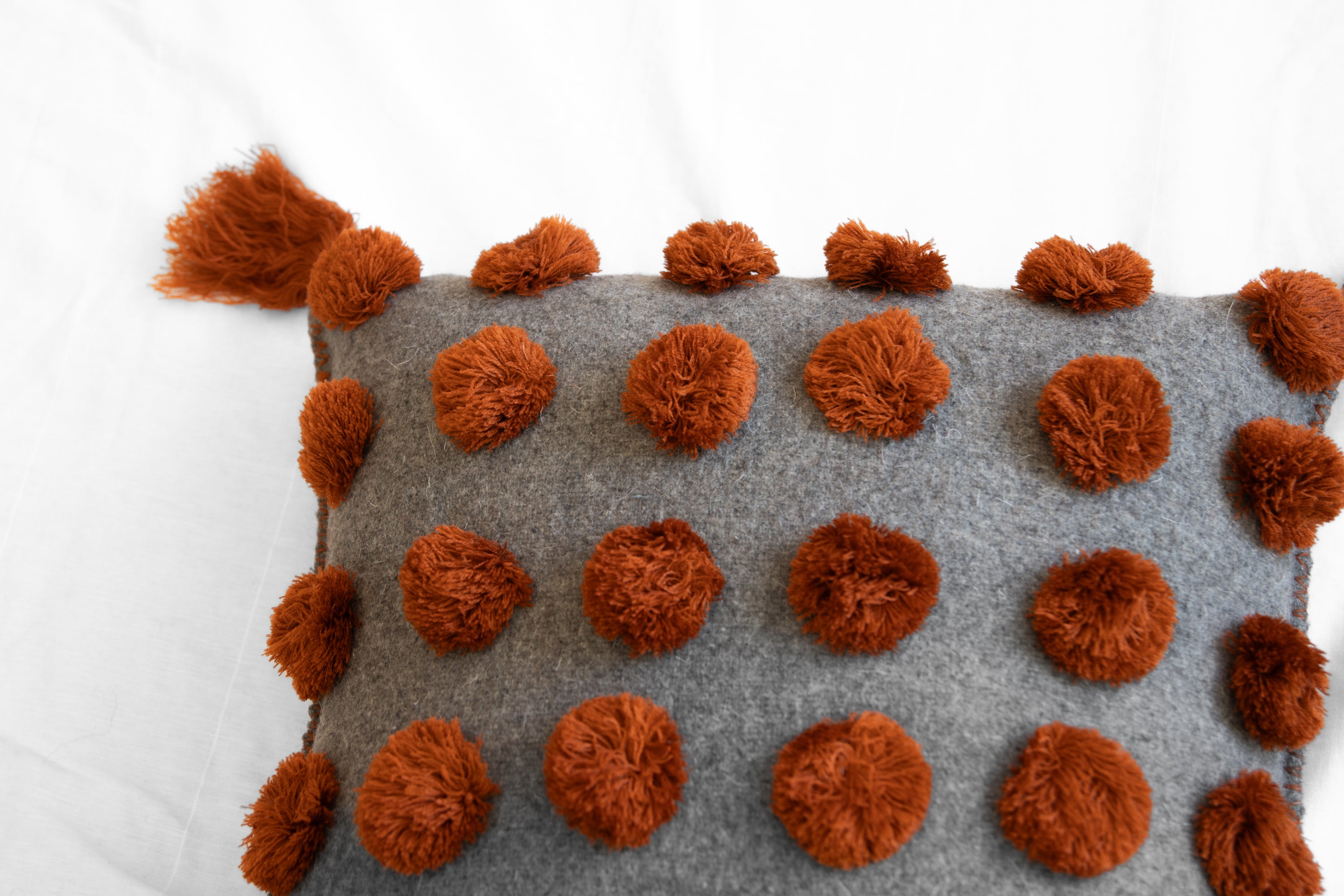 ULA Pillow - Terracotta on Grey