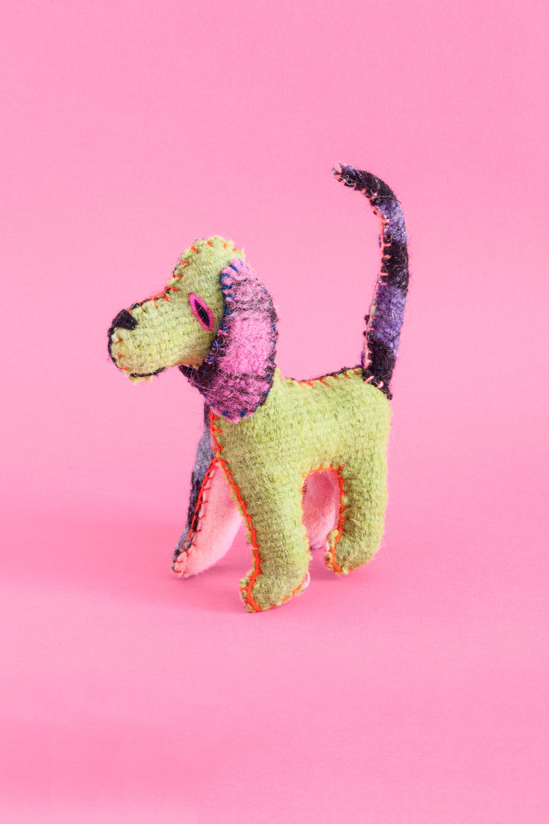 Colorful felt dog plush toy with hand-embroidered features.