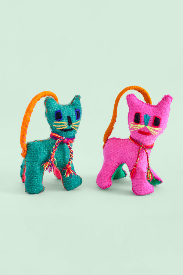 Two colorful felt cat plush toys with colorful hand-embroidered features. Multicolor braided threads are tied around the cat's collar, and the tail is stitched from the rear to the head to use as a strap
